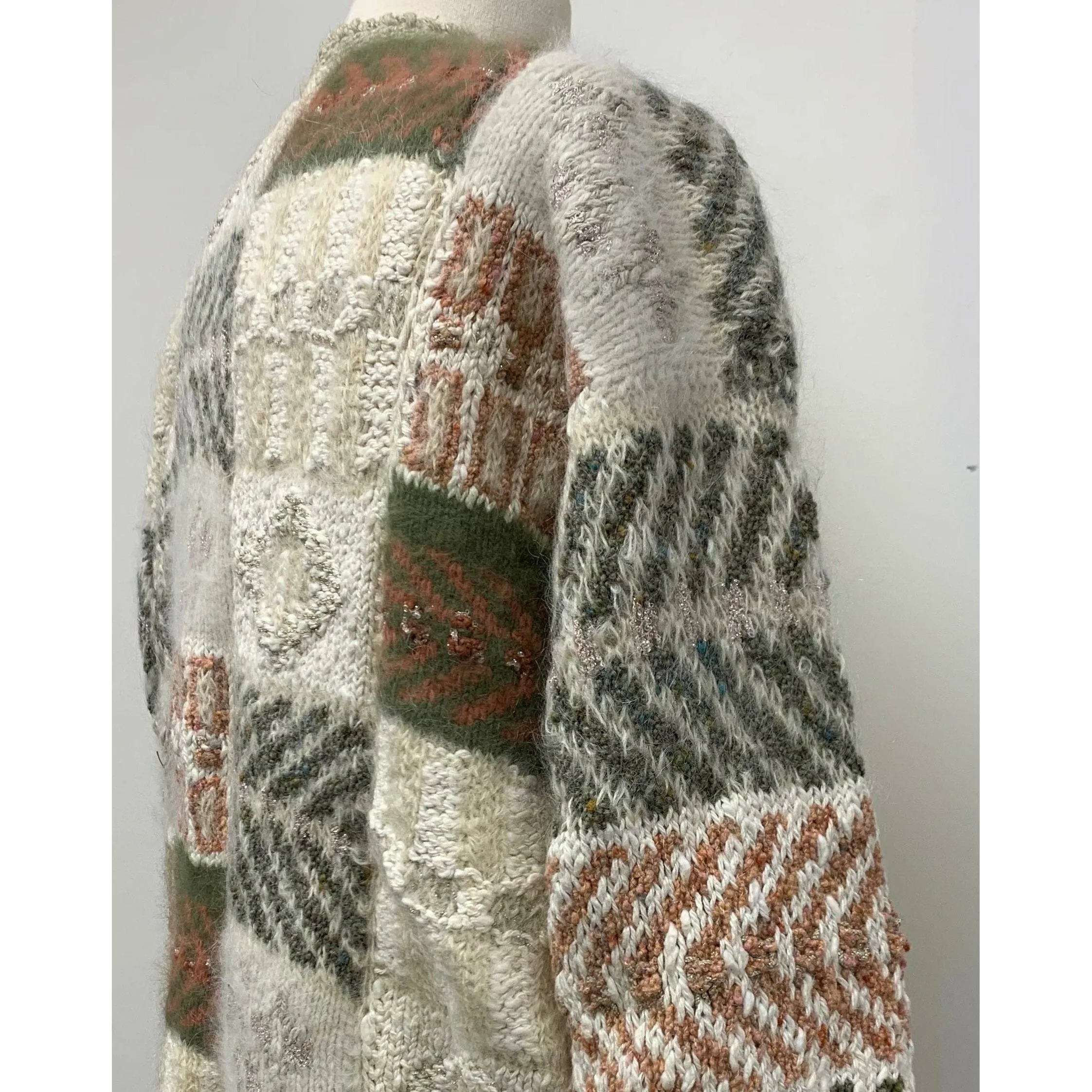 1980 Anny Blatt designed hand knit. The yarns are all French and Italian. Wool, Angora, Cotton, Linen and Mohair. Size M