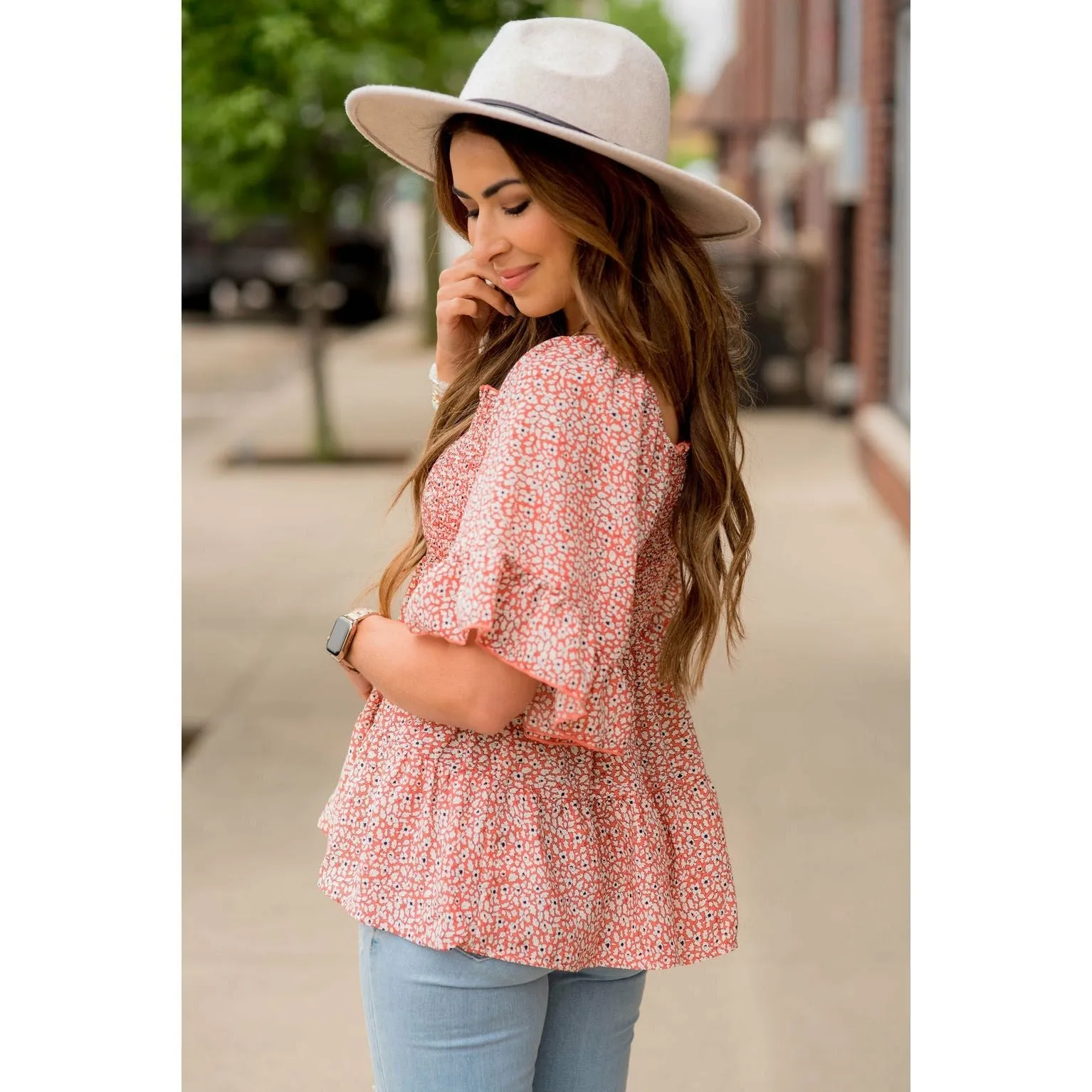 Blooming Ruffles Smocked Peplum Blouse